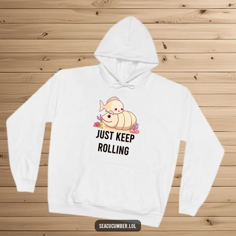 Funny small fish nudging a rolling sea cucumber, charming ocean-themed hoodie for ultimate comfort.